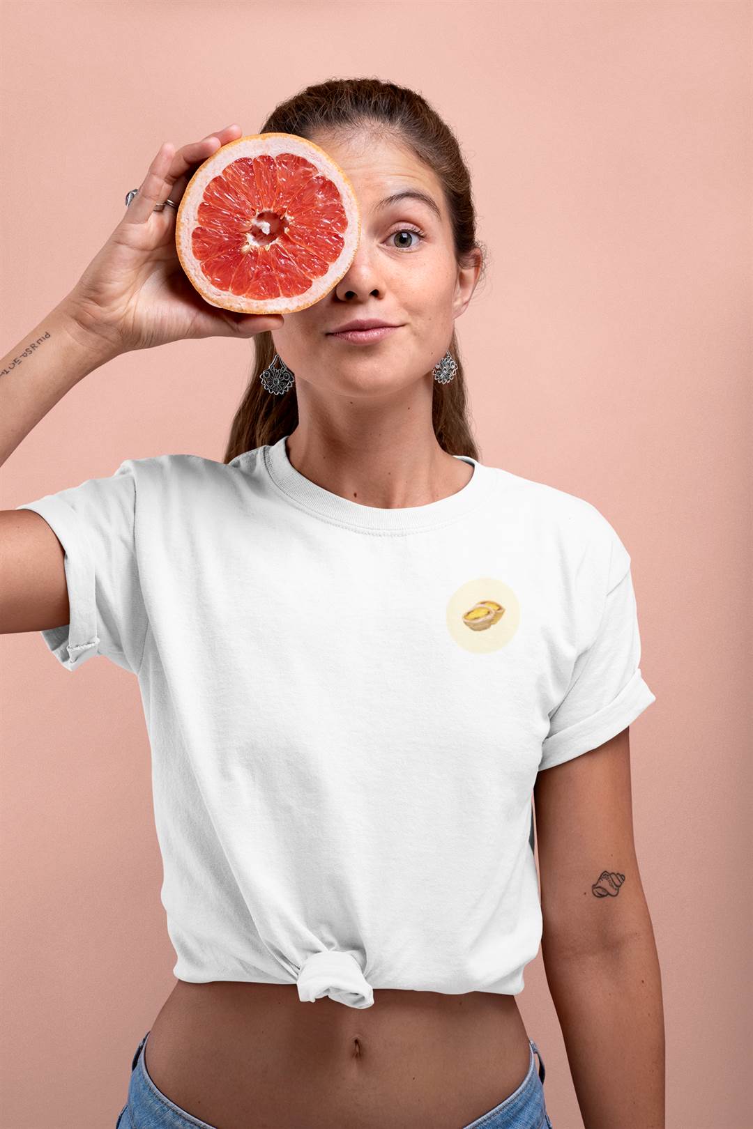 Woman wearing a organic tshirt with Lisbon's Pasteis de Belem logo