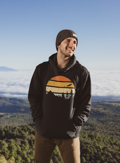 Close-up of the organic cotton fabric with retro mountain and surf logo on the hoodie.