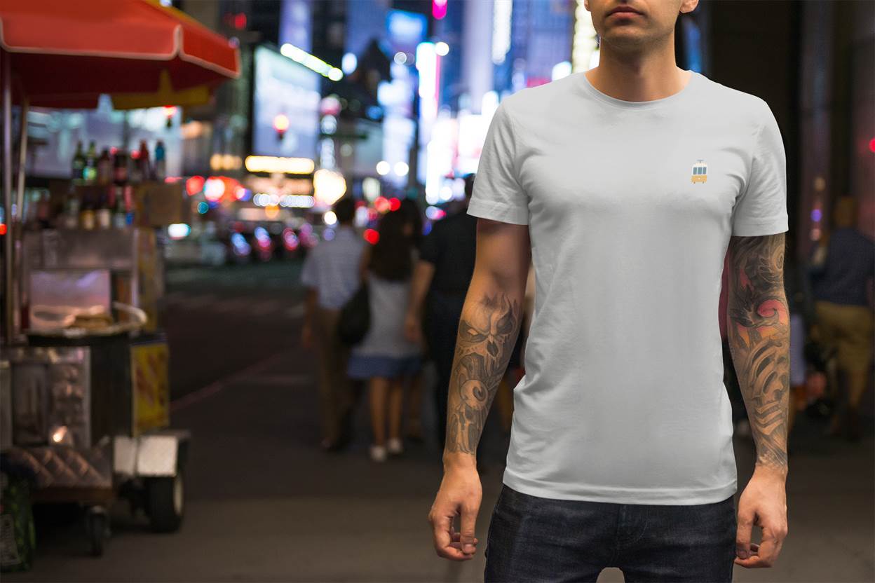 Sustainable fashion piece with an embroidered Lisbon tram design on a men’s T-shirt.