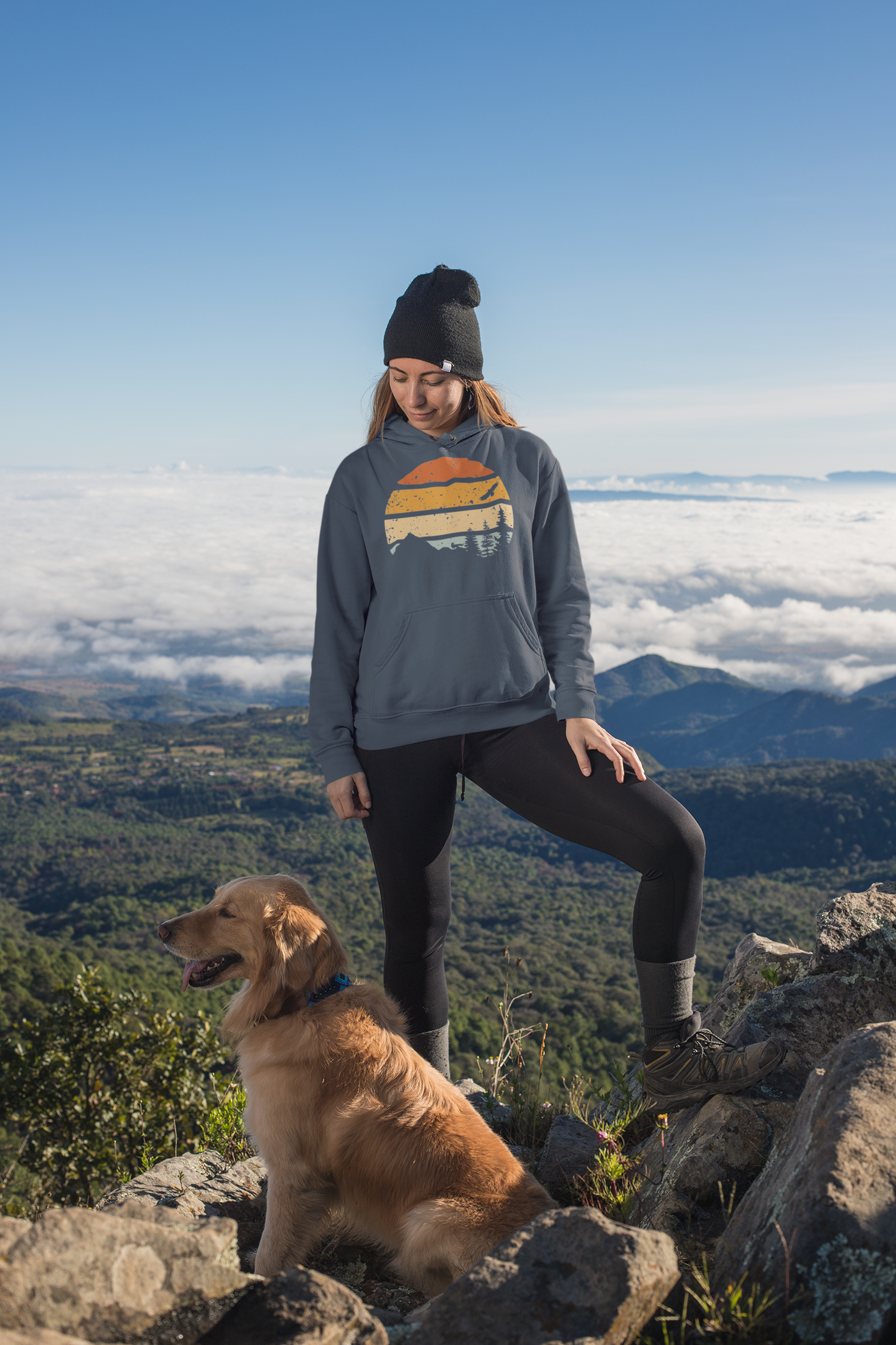 Detailed view of retro mountain and surf logo on the Madeira-inspired hoodie.