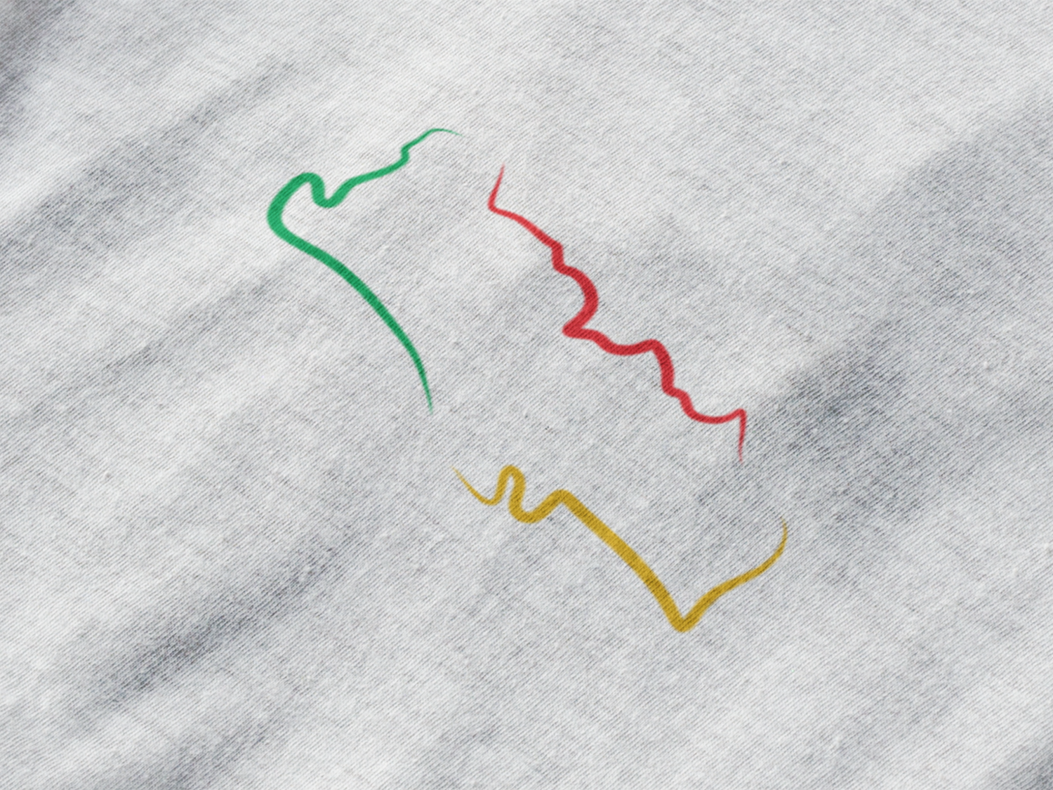 Close-up of the organic cotton fabric with the minimalist Portuguese map silhouette.