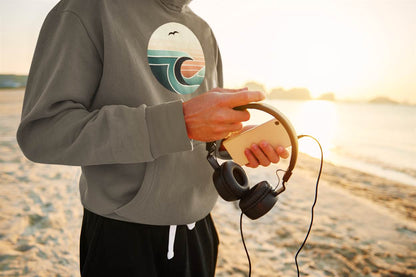 Close-up of the organic cotton fabric with wave and seagull design on the hoodie.