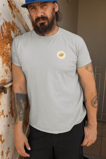 Minimalist design featuring a Pastel de Nata on a T-shirt.